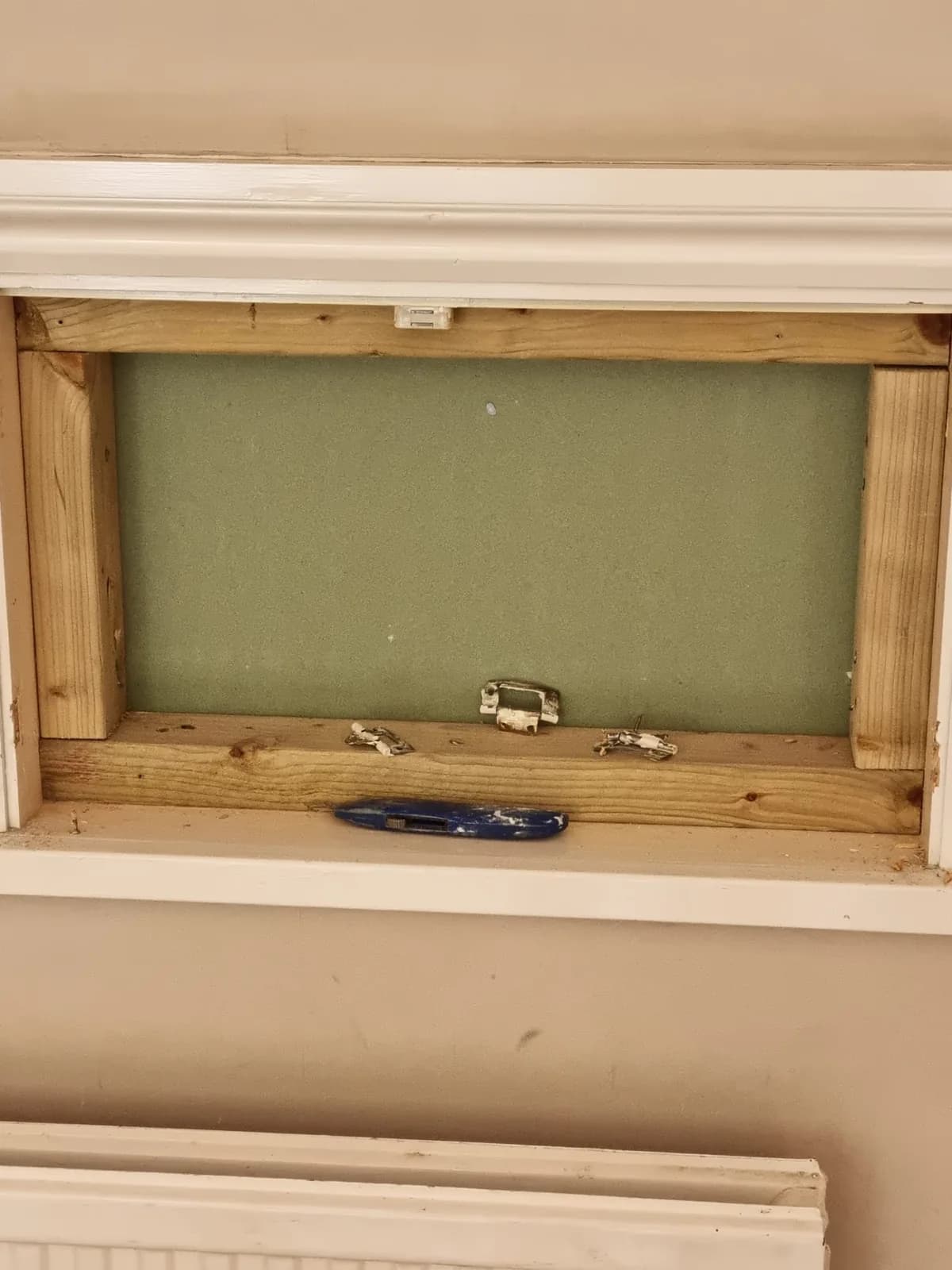Timber-framed chimney breast opening prepared for finishing