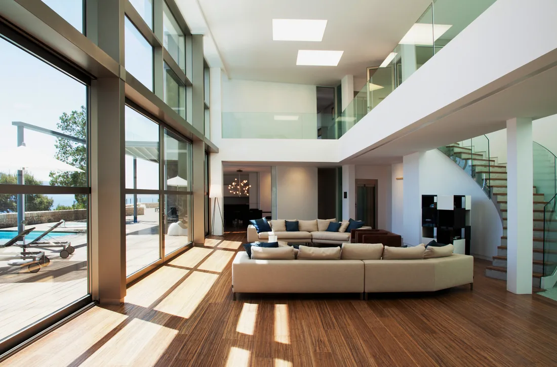 Bright open-plan living room filled with natural daylight